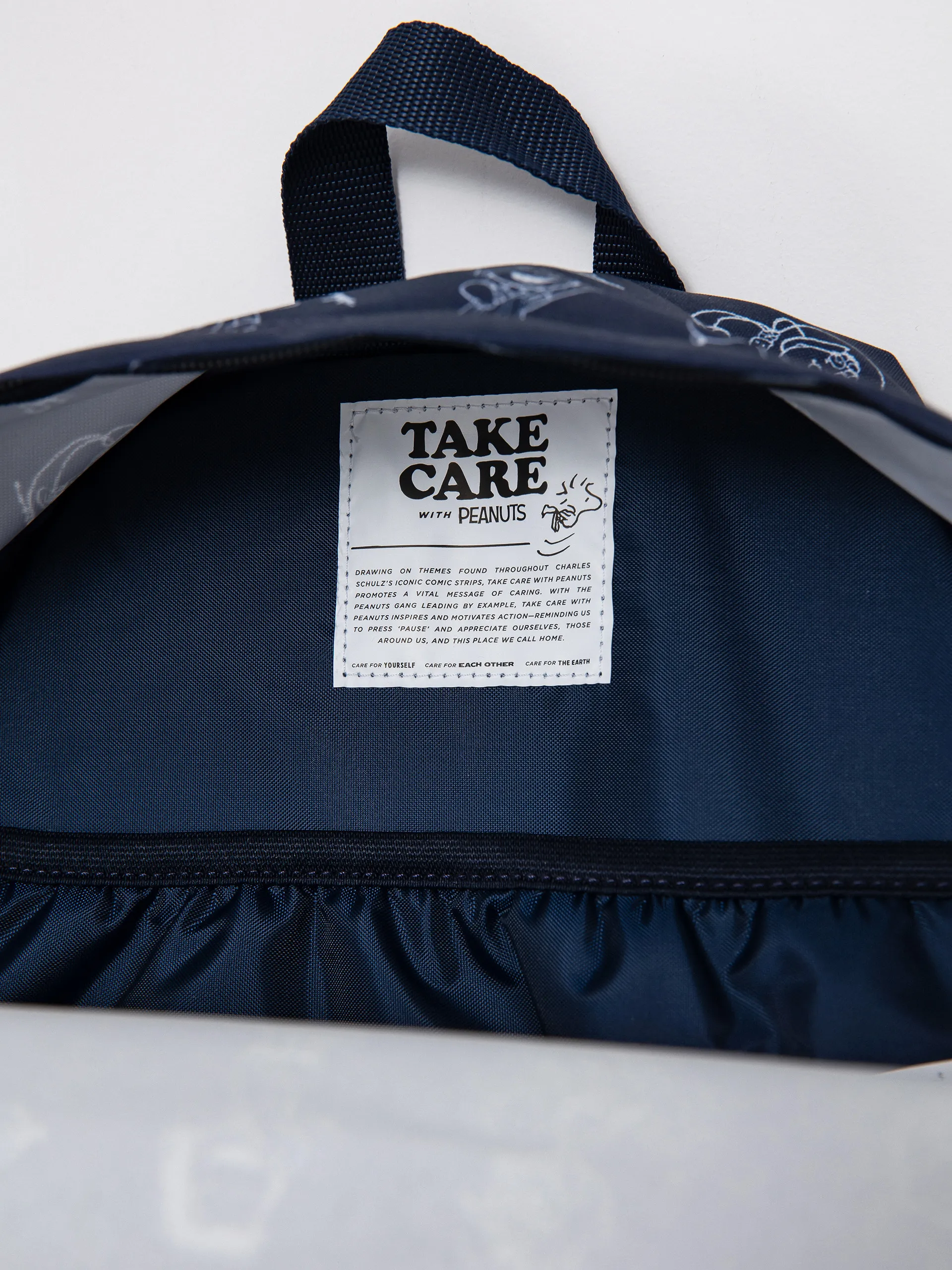 Eastpak X Peanuts Padded Pak'R Backpack (peanuts navy)